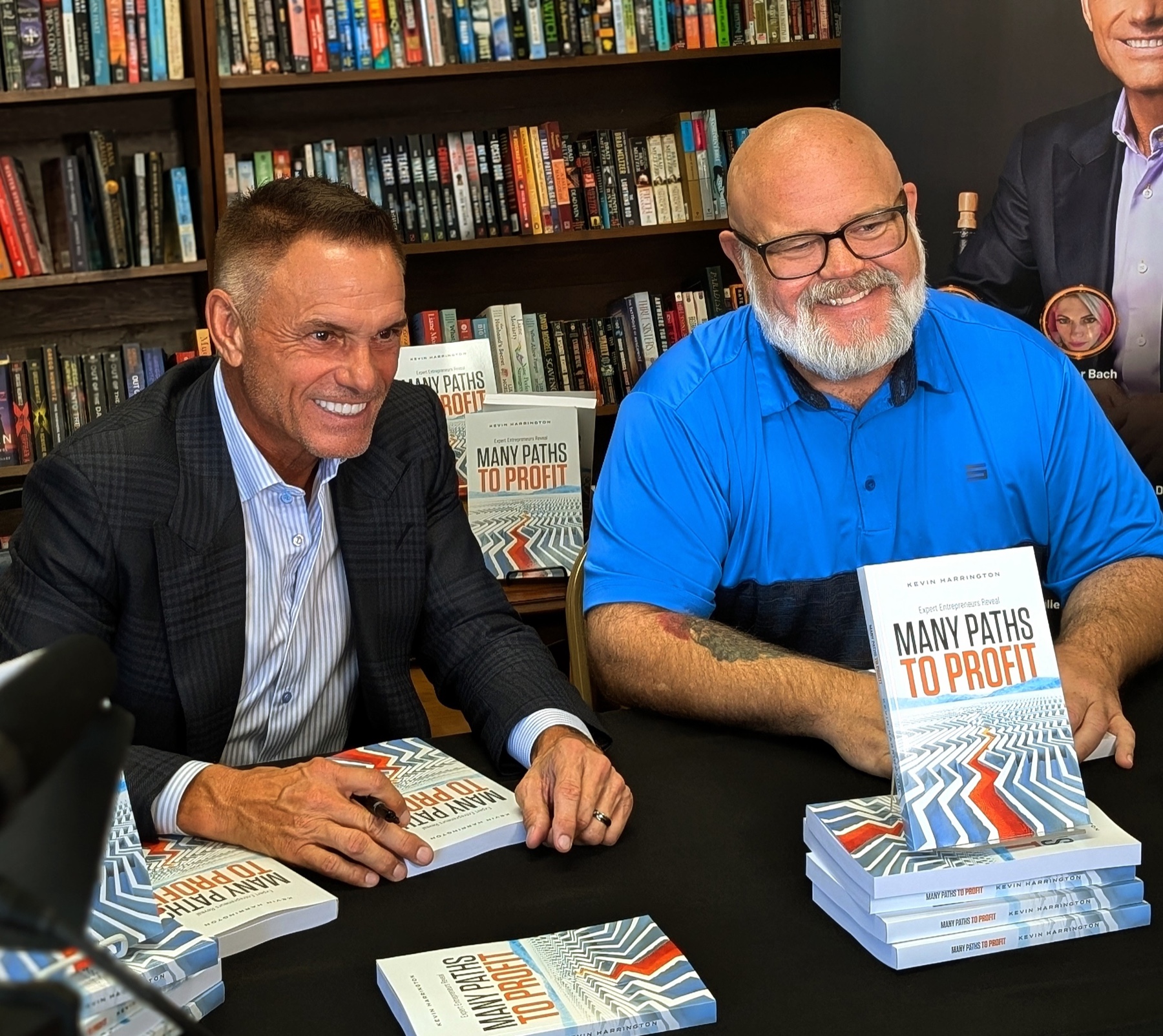 Ken Cox with Kevin Harrington and copies of Many Paths to Profit